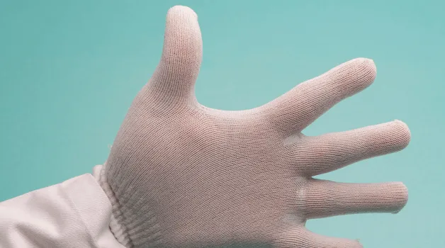 I have to double glove in my cleanroom and am having trouble with perspiration, any ideas?